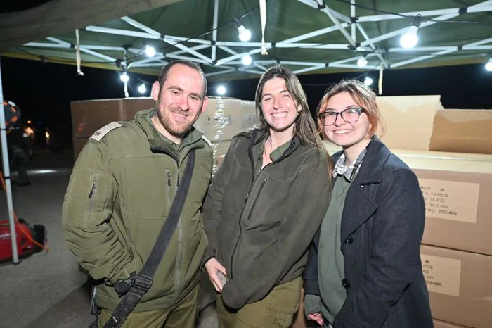 Distributing gear to soldiers.