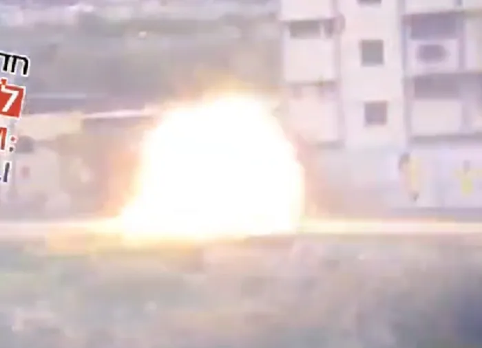 Tzur and his teammates advance with their convoy while conducting road-clearing operations inside Gaza.