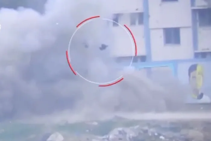 Tzur is thrown clear — his vest absorbing the majority of the blast and shrapnel.