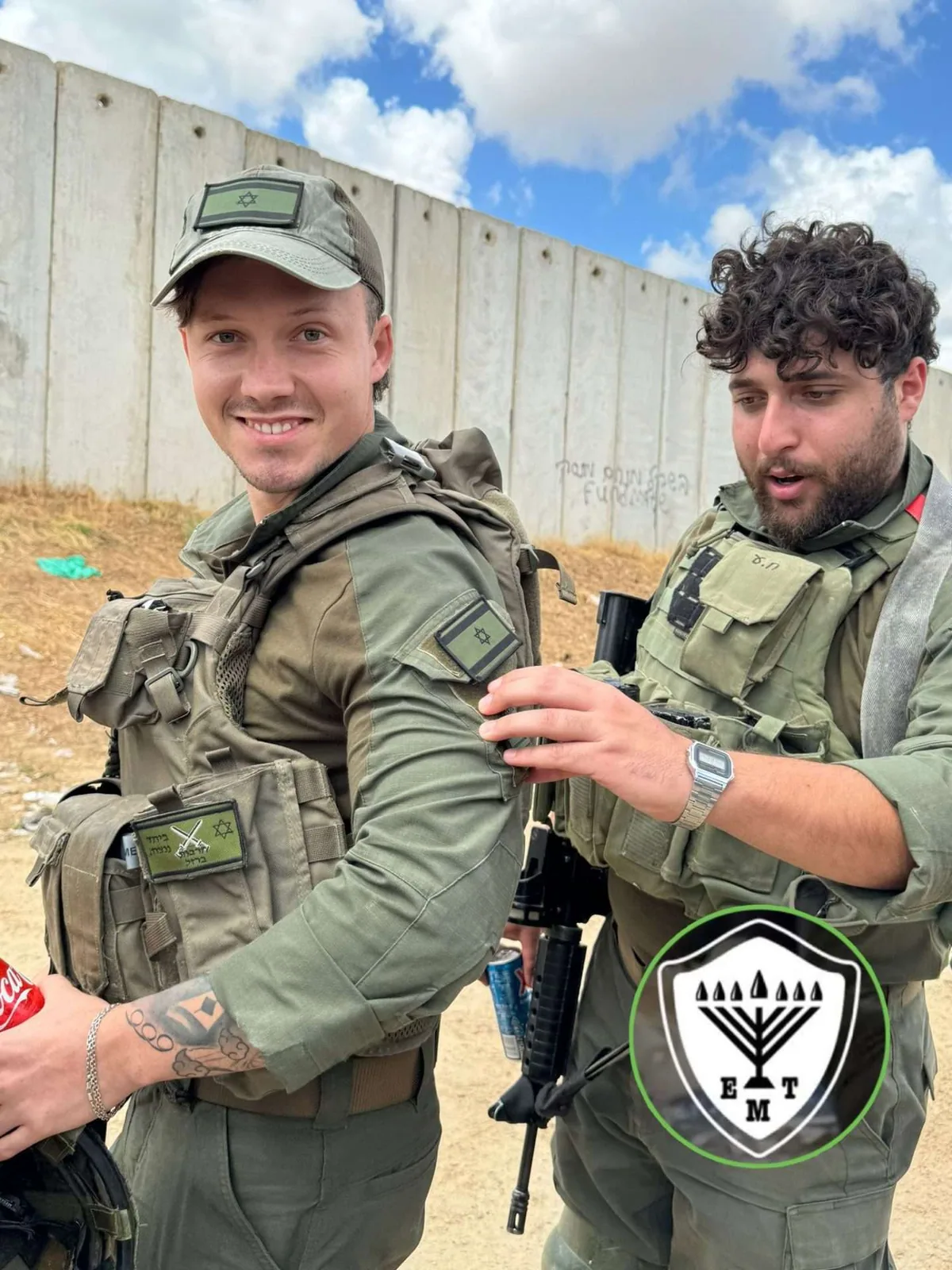Soldiers receiving food and drink from Heart and Soul volunteers.