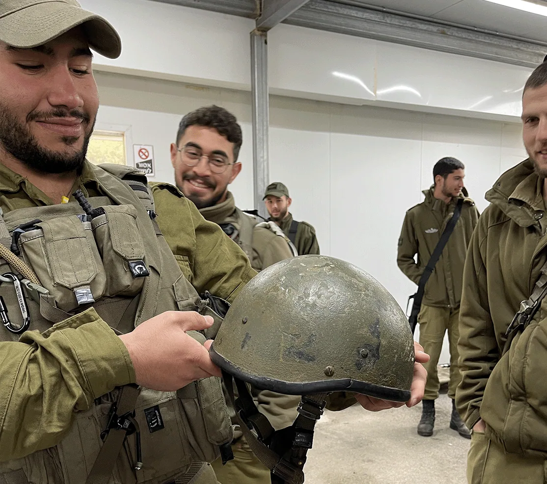 An older-issue helmet penetrated by a live round fired from 45 metres.