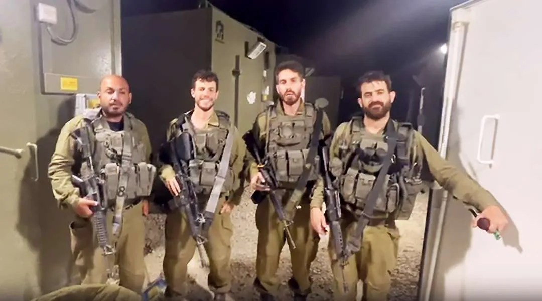 Soldiers of Battalion 9232 in the Netzarim Corridor wearing donated protective vests.